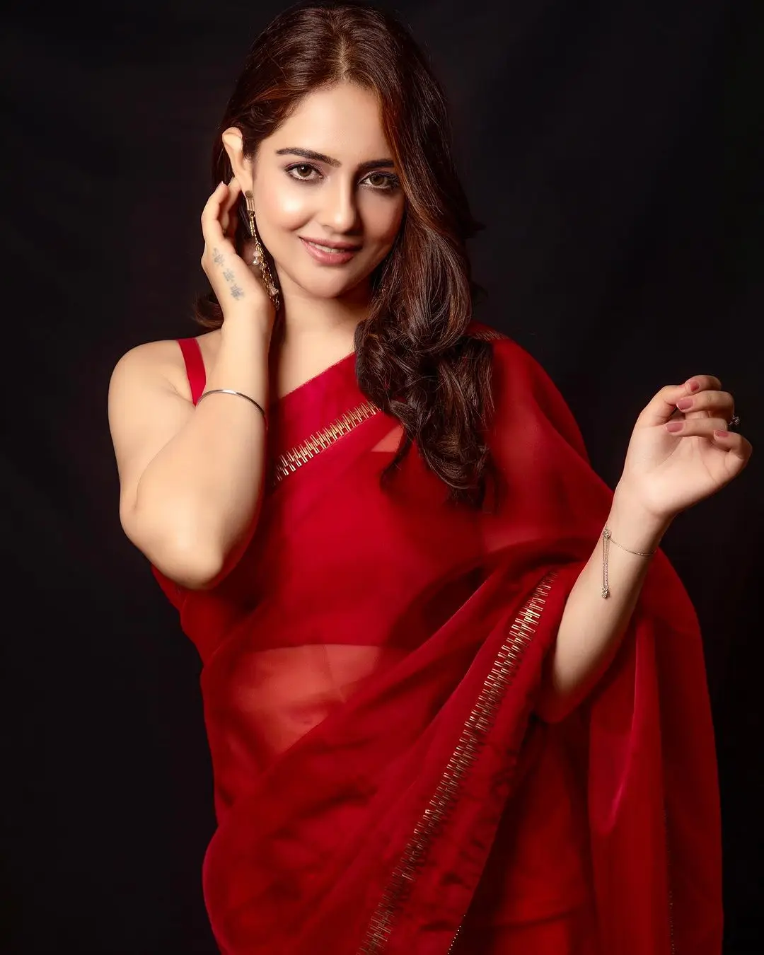 Malvi Malhotra Stills in Red Saree Sleeveless Blouse